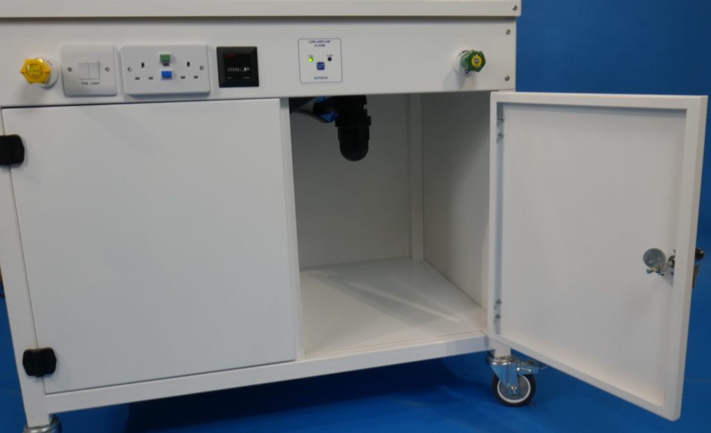 A Durapipe Vulcathene anti siphon bottle trap beneath the benching of the fume cupboard. Vulcathene is the market leading labratory drainage product range.